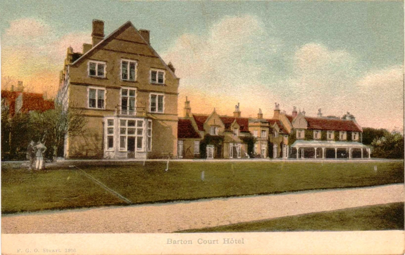 A vintage postcard shows Barton Court Hotel, a large three-storey building with multiple chimneys, surrounded by a lawn and smaller connected buildings under a pastel sky.