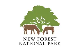 Logo of New Forest National Park showing two brown ponies grazing under a large green tree, with the words NEW FOREST NATIONAL PARK written below.